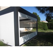 Store transparent façade motorisé pour pergola bioclimatique