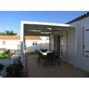 Pergola toile tendue entrelacée autoportée 6x4 contre maison