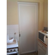 Porte de service PVC 1 vantail panneau plein arrière cuisine